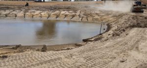 Our excavator clearing out a dam on a rural property in the Northern Territory
